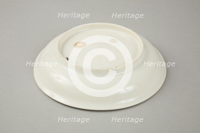 White dish with anhua design of two phoenix and cloud scroll design, Song dynasty, c.1300. Artist: Unknown.