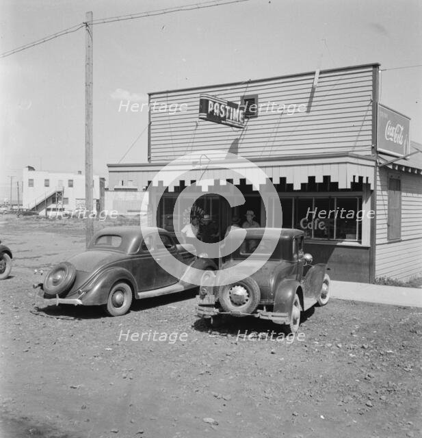 Pastime Cafe on main street of small potato town, Tulelake, Siskiyou County, California, 1939. Creator: Dorothea Lange.