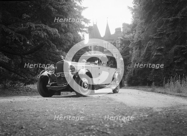 Kitty Brunell road testing a 1931 Delage D8, Wykehurst Place, Bolney, Sussex. Artist: Bill Brunell.