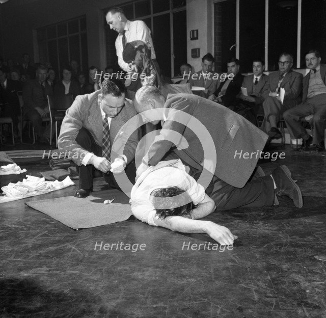 First aid competition, Mexborough, South Yorkshire, 1961. Artist: Michael Walters