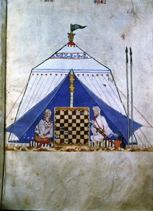 Moor and Christian playing chess inside a tent. Miniature in the 'Book of the games, chess, dice …