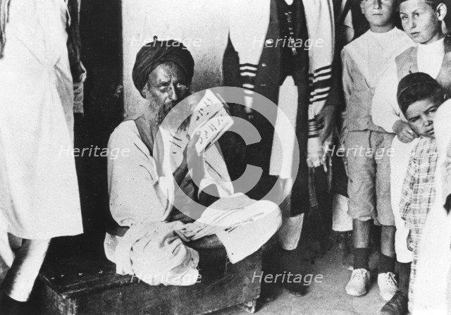Writing an amulet against bad luck, Libya, c1970s. Artist: Unknown