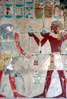 Detail of painted relief of Tuthmosis III before Horus, Temple of Hatshepsut, Luxor, 15th centuryBC. Artist: Unknown