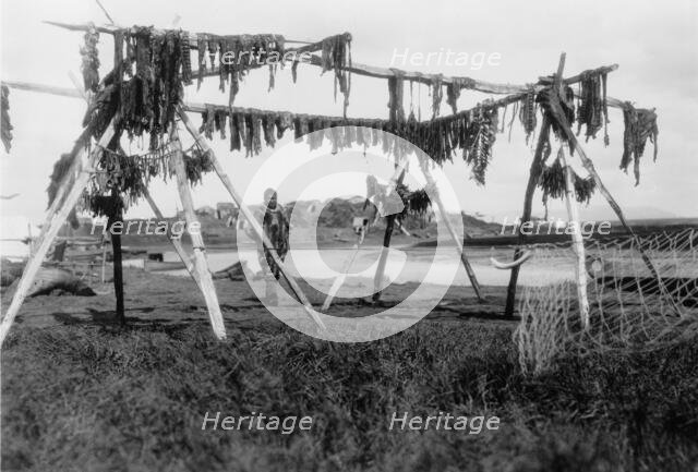 Drying whale meat-Hooper Bay, c1929. Creator: Edward Sheriff Curtis.