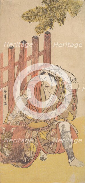 The Fourth Matsumoto Koshiro as an Outlaw Looking at a Wooden Ninsogaki, ca. 1779-83. Creator: Shunsho.