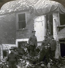 Destruction wrought by German Zeppelin bombs, World War I, 1914-1918.Artist: Realistic Travels Publishers