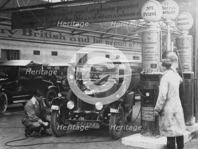 Morris Cowley Bullnose in a garage, 1925. Artist: Unknown