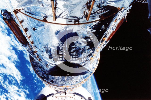 The Hubble Space Telescope orbiting the Earth, c1990s. Artist: Unknown