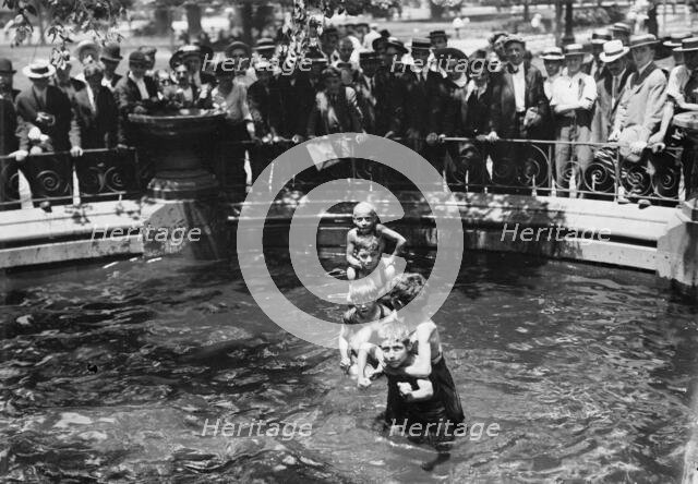 Fountains, Madison Sq. Park on hot day, between c1910 and c1915. Creator: Bain News Service.