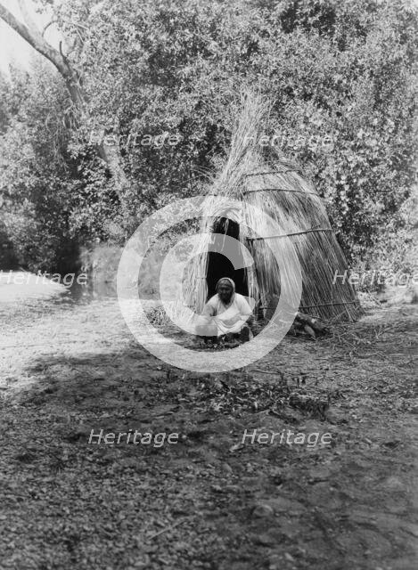 Cooking acorns-upper Lake Pomo, c1924. Creator: Edward Sheriff Curtis.