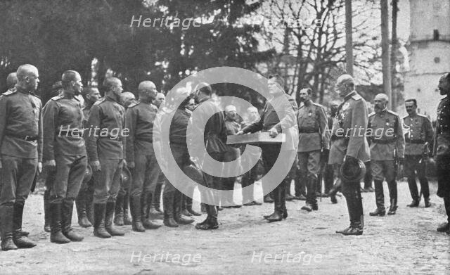 'Aux armees Russes reorganisees; Au quartier imperial: le baiser de paques du Tsar..., 1916 (1924) Creator: Unknown.