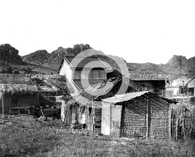 Village huts in Korea, 1900. Artist: Unknown