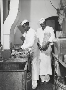 African American restaurant workers, Investment Pharmacy, Washington, D.C., July 1941. Creators: Farm Security Administration, Jack Delano.