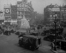 People and Traffic Moving Through a Busy Junction in London, 1943. Creator: British Pathe Ltd.