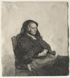 The Artist's Mother Seated at a Table, Looking Right: Three Quarter Length, c. 1631. Creator: Rembrandt van Rijn (Dutch, 1606-1669).