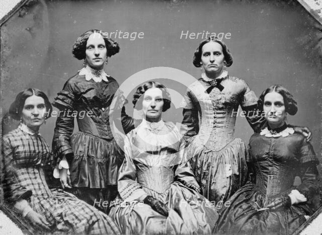 Clark sisters, five women, three-quarter length portraits, all facing front, between 1840 and 1860. Creator: Unknown.