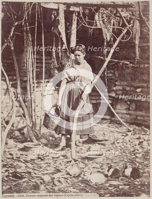 Woman Caring for Rabbits, Cordoba, c1885. Creator: Juan Laurent.