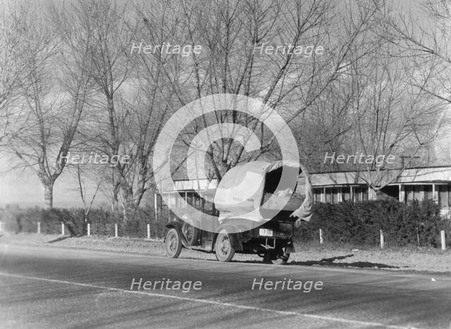 Texans earning their way westward, bound for a new start in Oregon, US 99, California, 1935. Creator: Dorothea Lange.