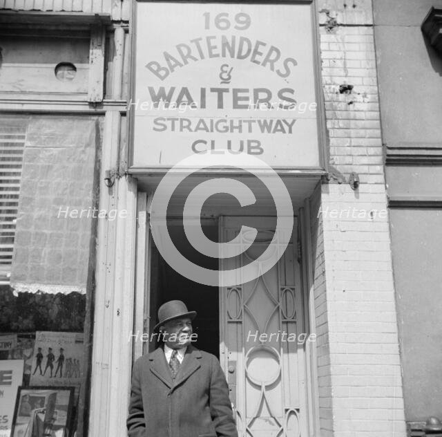 Bartenders' and waiters' club entrance in the Harlem area, New York, 1943. Creator: Gordon Parks.