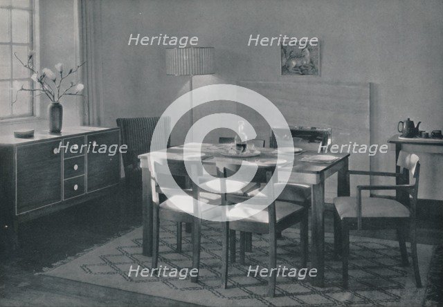 'The Dining Room - Walnut and sycamore furniture', 1942.  Artist: Unknown.