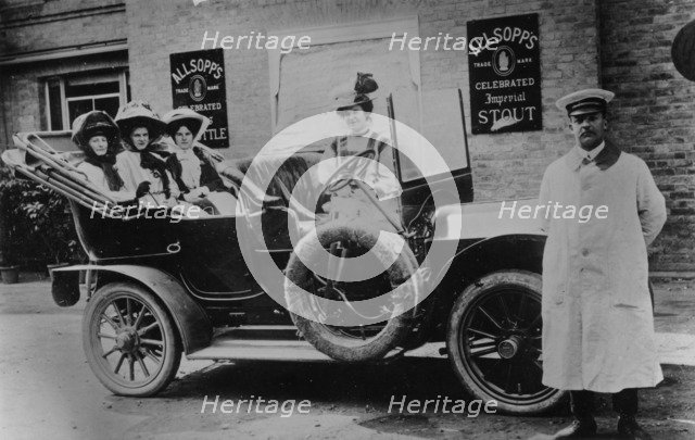 A group of ladies in a car, with their uniformed chauffeur, 1910. Artist: Unknown