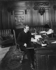 Herbert Putnam in his office. Librarian of Congress, between 1890 and 1910. Creator: Unknown.