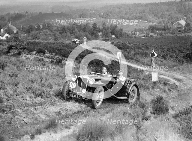 1936 MG TA taking part in the NWLMC Lawrence Cup Trial, 1937. Artist: Bill Brunell.