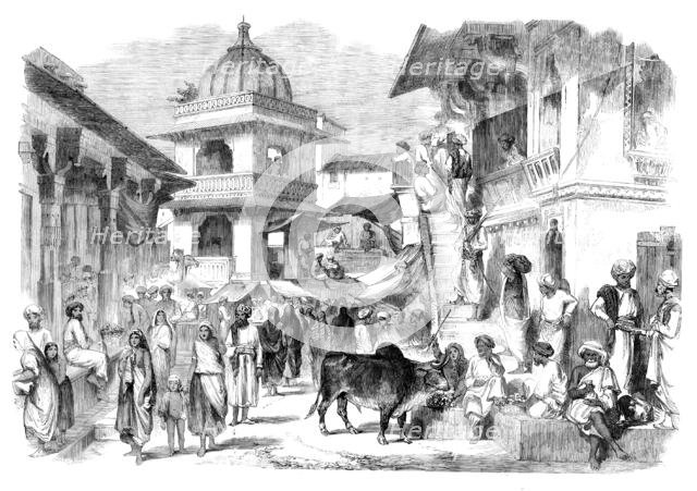 The Bazaar, Oodipoor, Rajpootana - from a drawing by W. Carpenter Jun., 1858. Creator: Unknown.