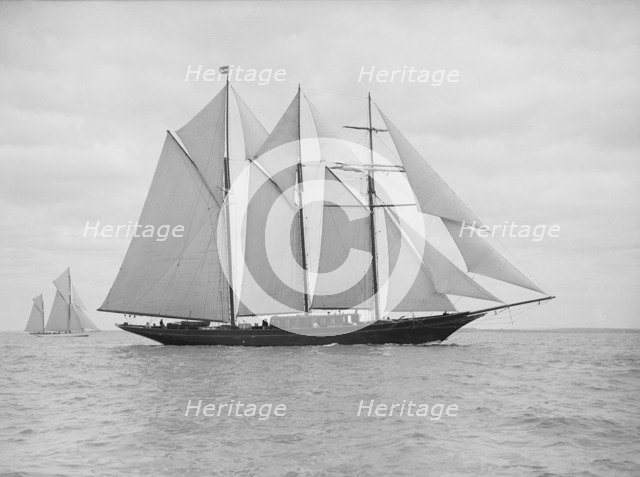 The auxiliary schooner 'La Cigale' sailing close-hauled, 1913. Creator: Kirk & Sons of Cowes.
