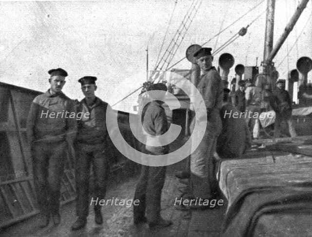 A torpedoing immediately avenged; Prisoners of the 'UC-38' aboard transport..., 1917. Creator: Unknown.