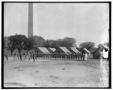 Military camp; base of Washington Monument, between 1910 and 1920. Creator: Harris & Ewing.