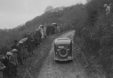 Standard saloon of AG Jones competing in the MCC Lands End Trial, 1935. Artist: Bill Brunell.