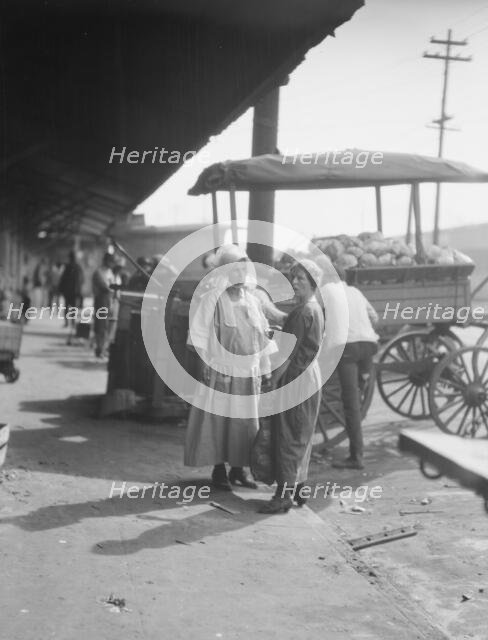 Market scene, New Orleans, between 1920 and 1926. Creator: Arnold Genthe.