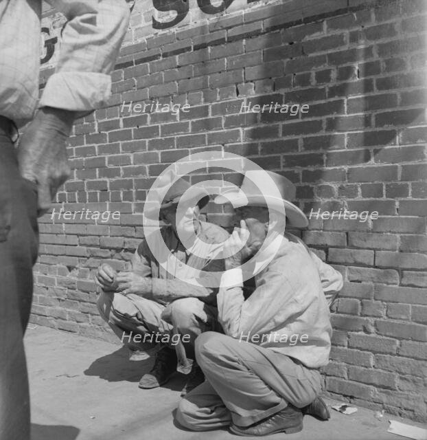 Farmers on street corner, Odessa, Texas, 1937. Creator: Dorothea Lange.