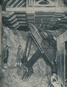 'Clawing Out the Heart of a Mountain for a Colorado City Tunnel', c1935. Artist: Unknown.