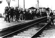 German soldiers on a railway platform awaiting transport, Paris, August 1940. Artist: Unknown