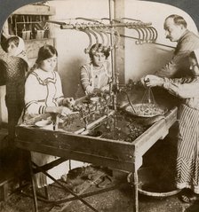 Manufacturing silk, Syria, 1900s.Artist: Underwood & Underwood