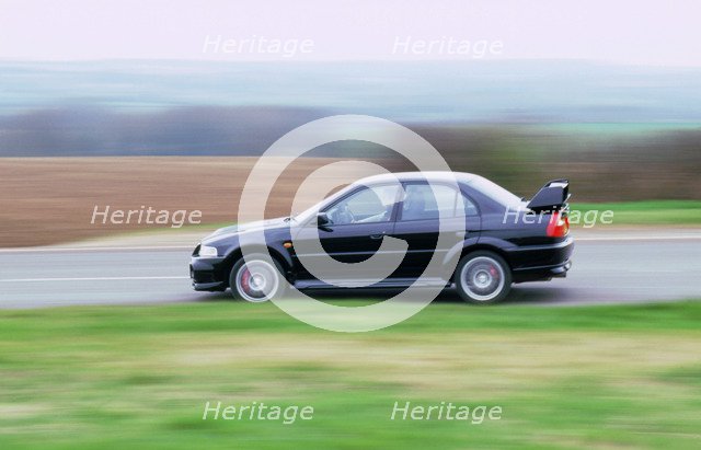 199 Mitsubishi Evo. Artist: Unknown.