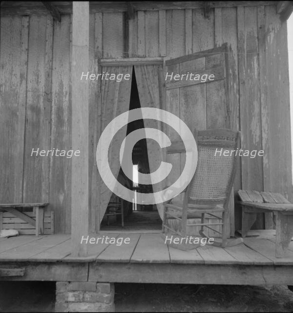 Cabin on sugar plantation, Bayou La Fourche, Louisiana, 1937. Creator: Dorothea Lange.