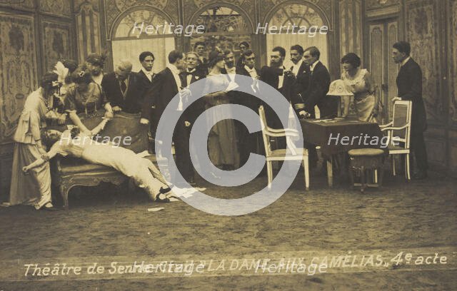 French or Belgian prisoners of war, some in drag, posing on stage during a crowded scene..., [1918?] Creator: Unknown.