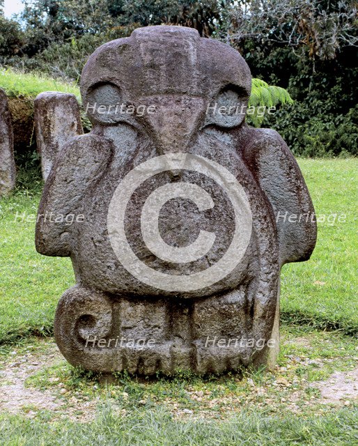 Archaeological park of San Agustín in Huila, Colombia. Eagle or condor with a snake in the beak a…