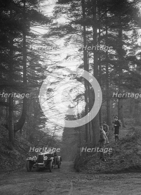Lea-Francis Hyper 2-seater competing in the JCC Half-Day Trial, Hurtwood Hill, Surrey, 1930. Artist: Bill Brunell.
