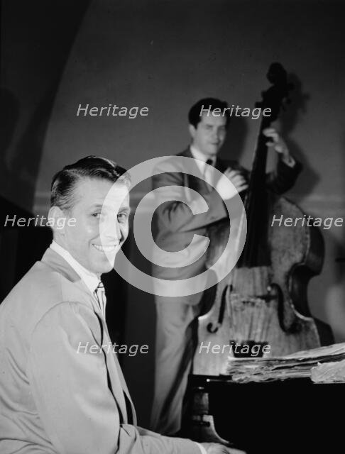 Portrait of Stan Kenton and Eddie Safranski, 1947 or 1948. Creator: William Paul Gottlieb.