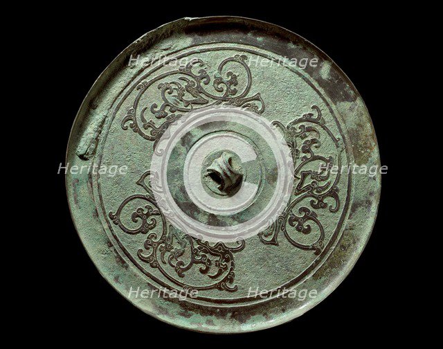 Ritual mirror with interlaced dragons on a geometric ground, 2nd century BC. Artist: Unknown.
