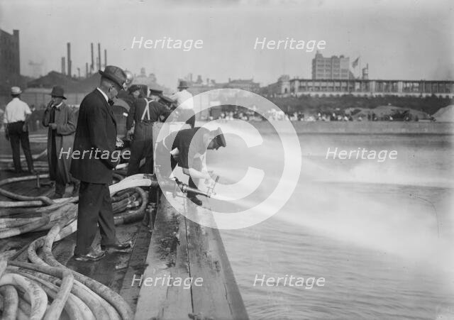 Testing stream from motor fire engines, 1913. Creator: Bain News Service.