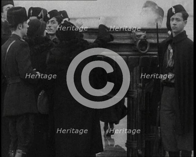 People Donating Their Gold into a Melting Pot, 1936. Creator: British Pathe Ltd.