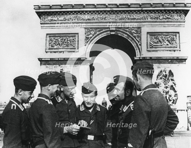 Occupying German troops at the Arc de Triomphe, Paris, June 1940. Artist: Unknown