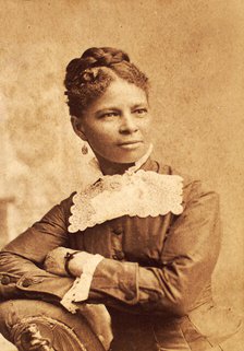 Half--length portrait of unidentified woman wearing wide lace collar, c1880-c1889. Creator: Richmond Photograph Co.