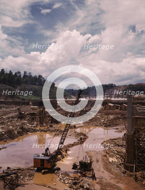 Early stages of construction work at the TVA's Douglas Dam, Tenn., 1942. Creator: Alfred T Palmer.