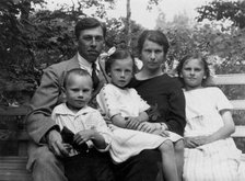 Briner Julius with his aunt Vera Dmitrievna Briner, uncle Felix Yulievich Briner, with his..., 1924. Creator: Unknown.